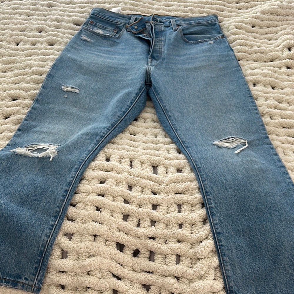 Levi's 501 distressed cropped jeans